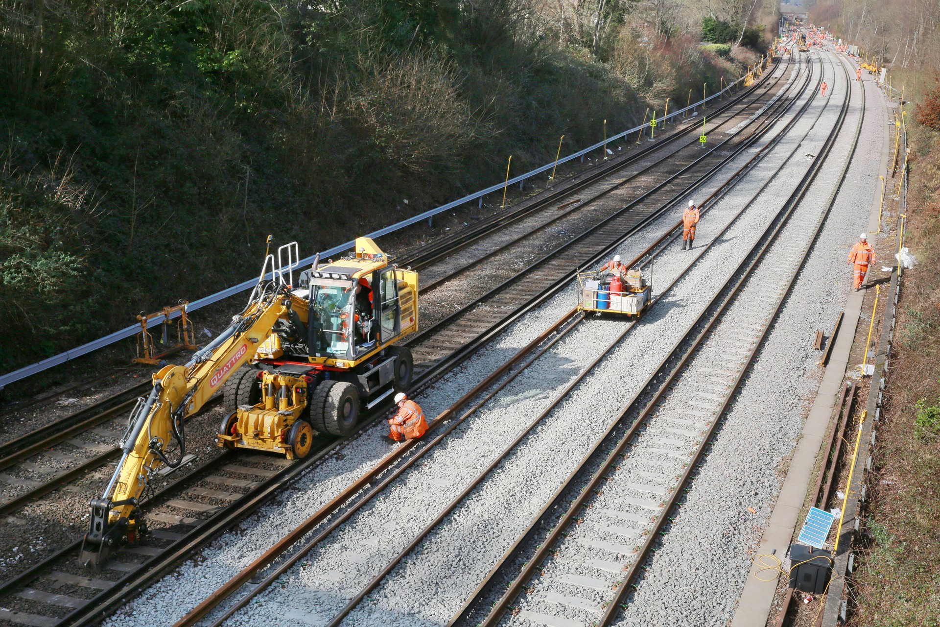 Railway workers performing maintenance on the track